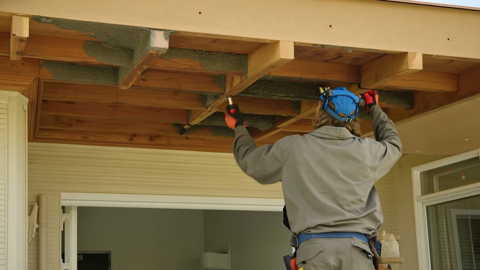 Restoration technician illustrating: Balcony and deck waterproofing failures above living space