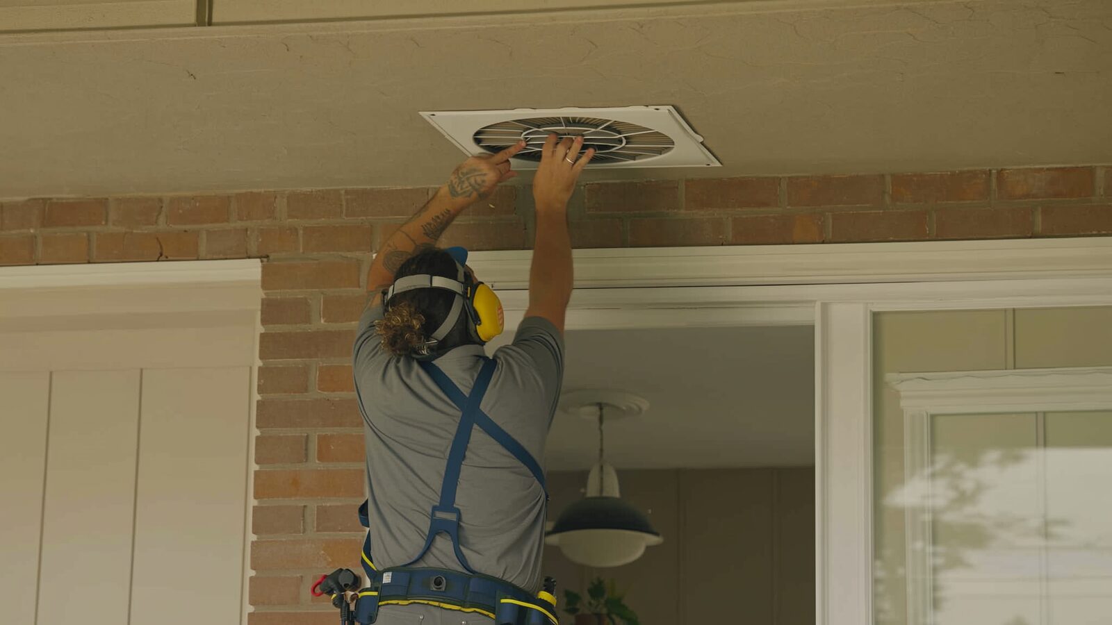 Restoration technician illustrating: Bathroom exhaust fans: the moisture control most homes underuse