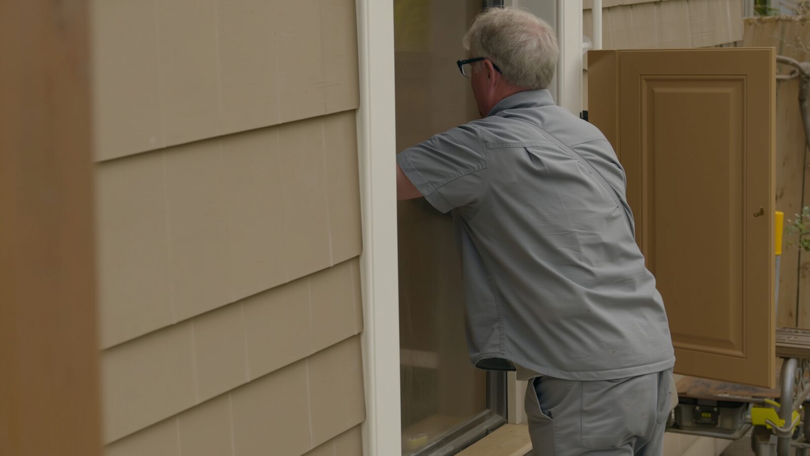 Restoration technician illustrating: When cabinets can be dried in place and when they come out