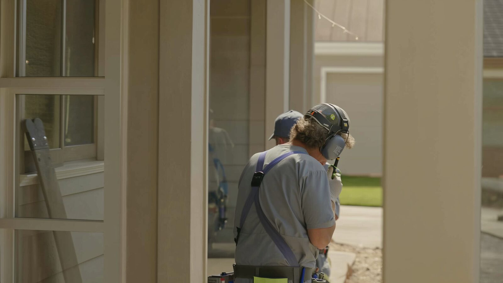 Restoration technician illustrating: The emergency mitigation authorization you sign on day one
