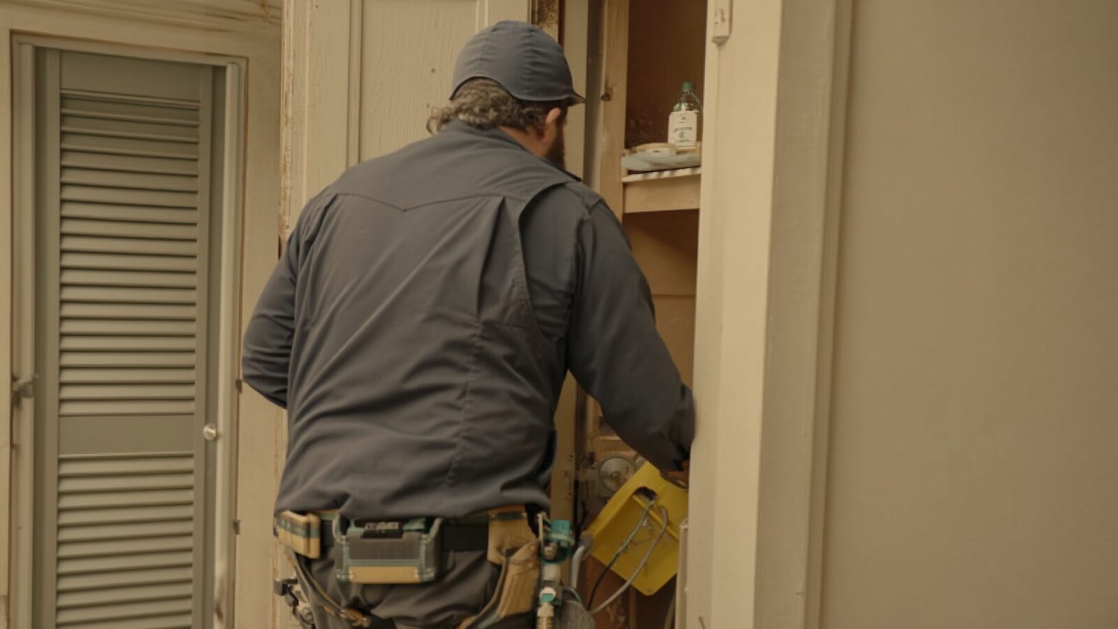Restoration technician illustrating: How a homeowners insurance fire claim typically proceeds, step by step