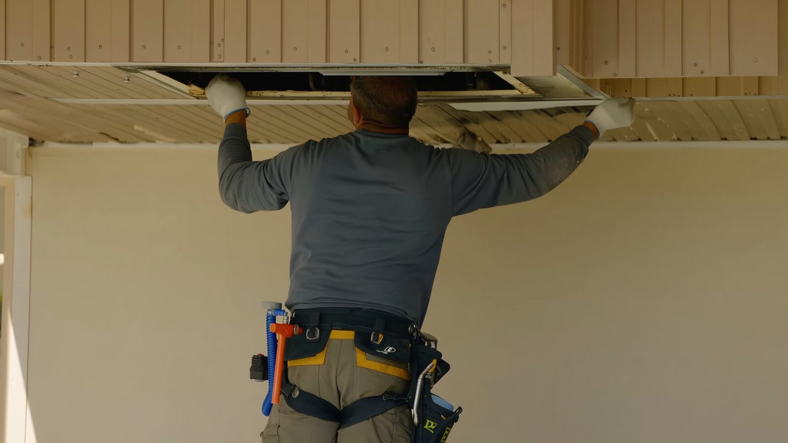 Restoration technician illustrating: When an HVAC system is replaced rather than cleaned after a fire