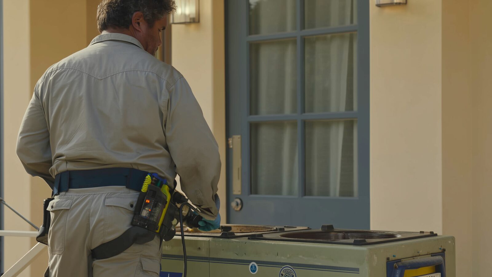 Restoration technician illustrating: Hydroxyl generators vs ozone: how each removes odor and when each is used