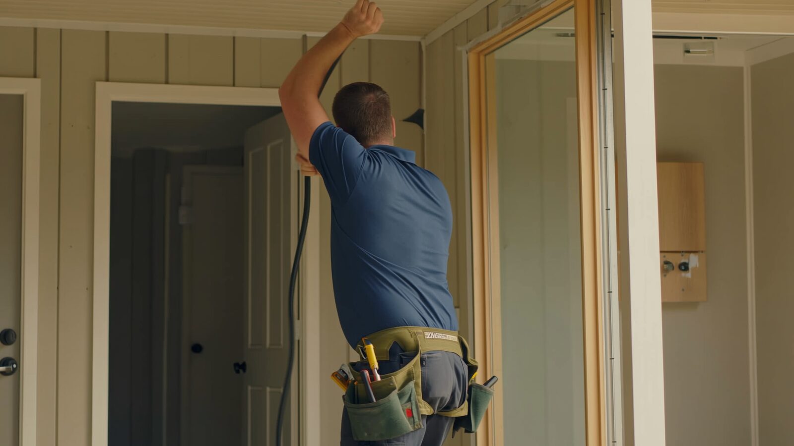 Restoration technician performing reconstruction & rebuild work at a property in Scottsdale, Arizona