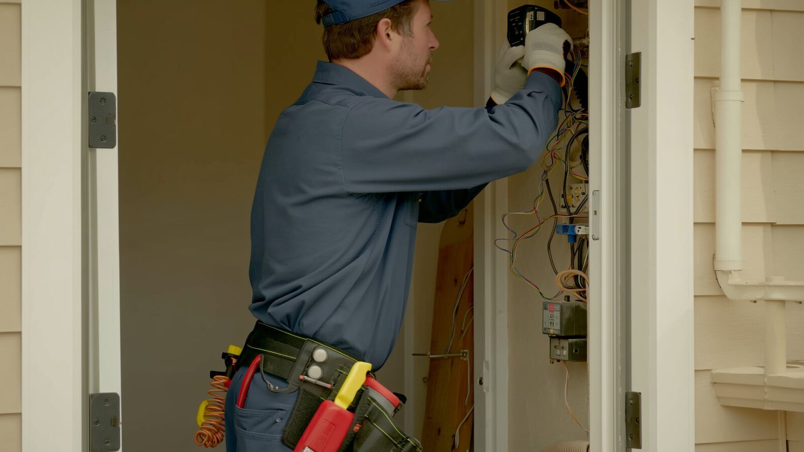 Restoration technician illustrating: Low-voltage and smart home wiring during reconstruction