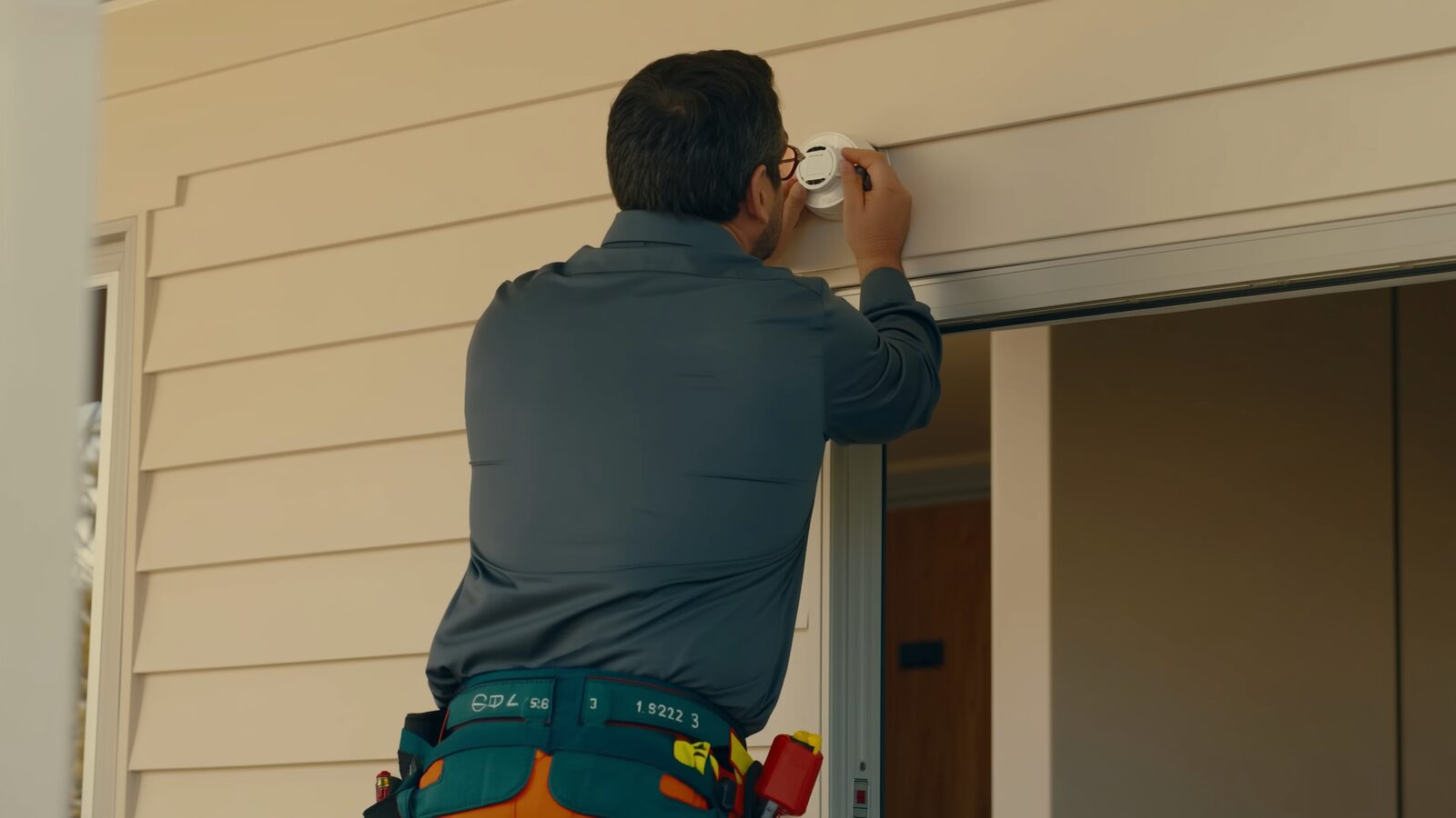Restoration technician illustrating: Smoke alarm placement, testing, and replacement intervals