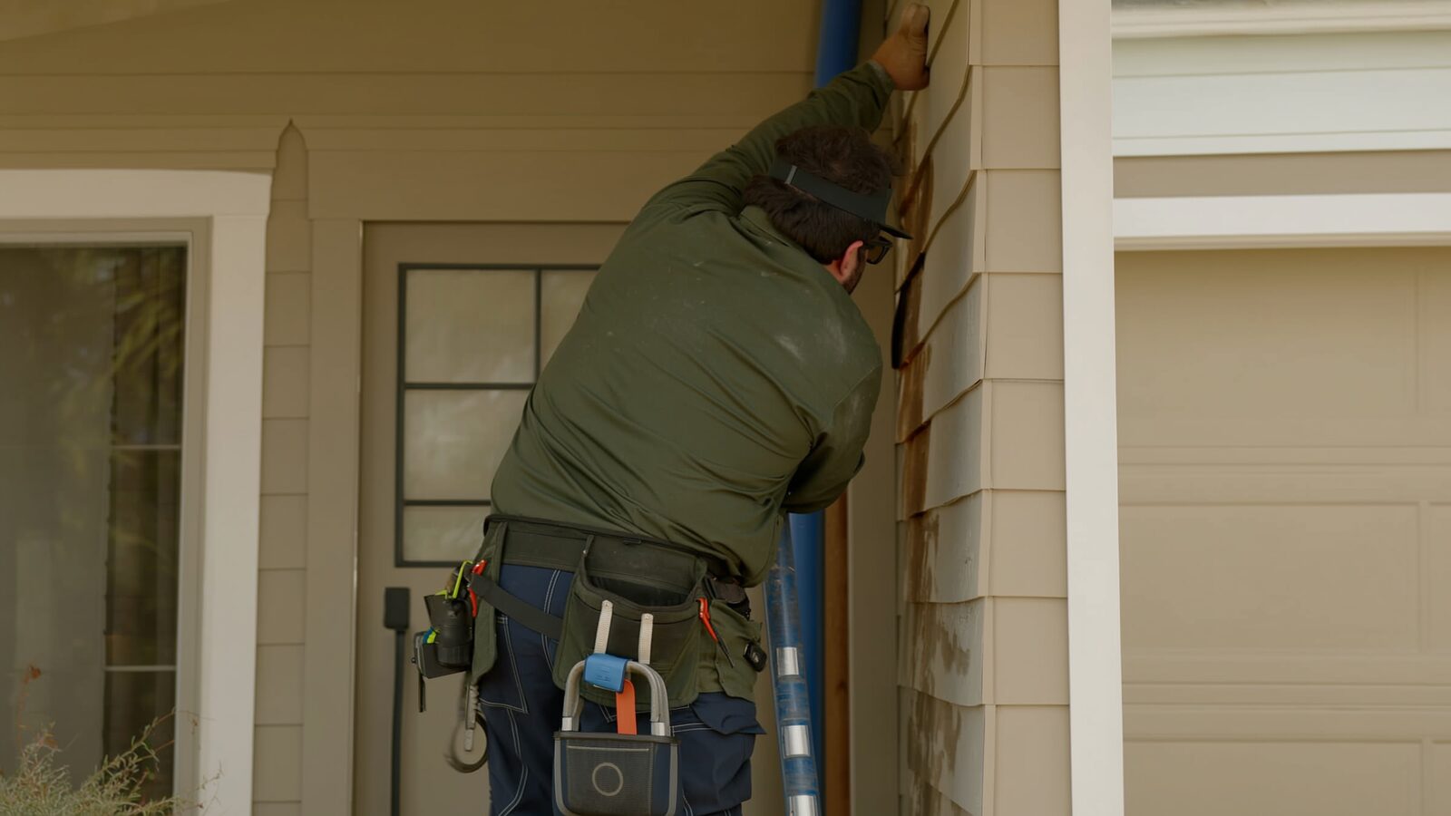 Restoration technician performing fire damage restoration work at a property in Tolleson, Arizona